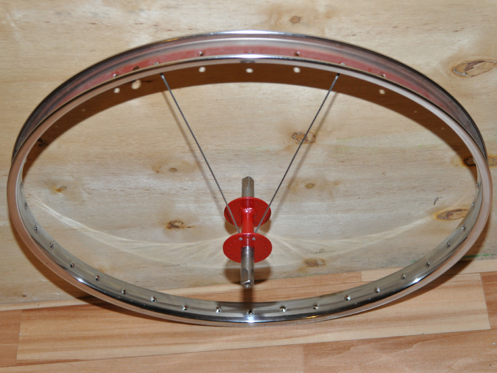 Unicycles Short and Tall - wheel lacing
